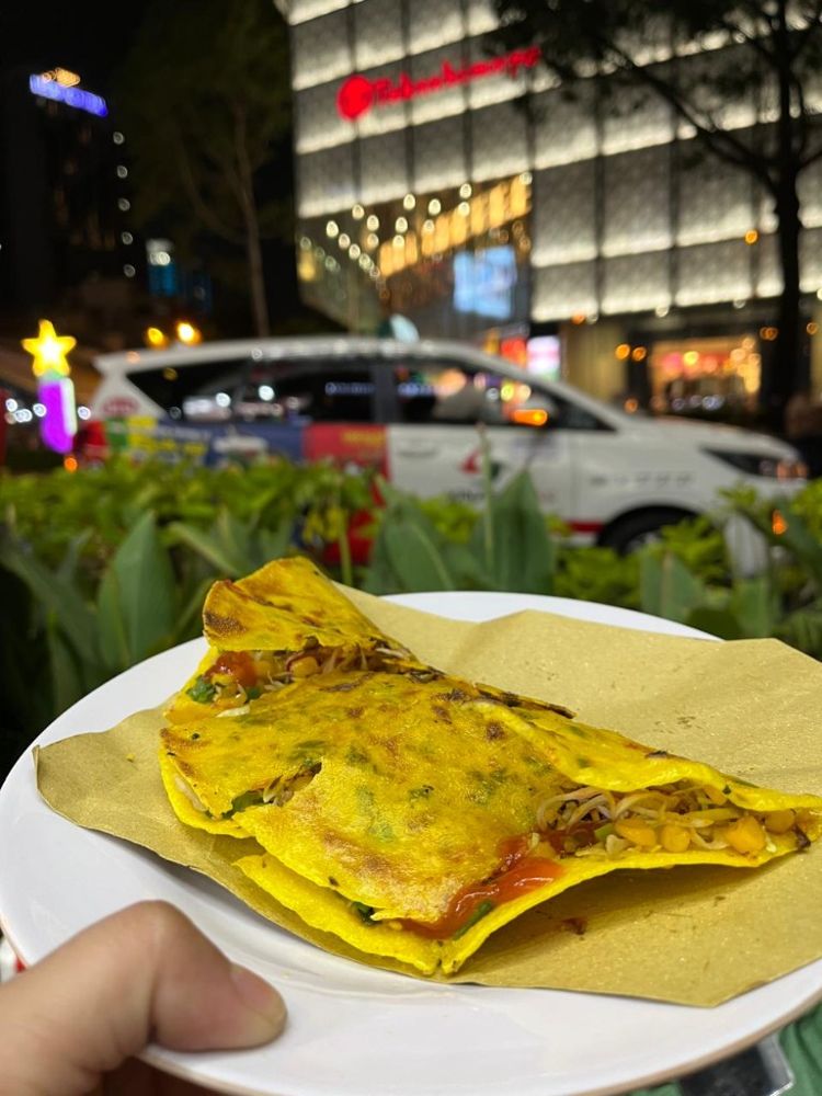 Bánh xèo street food at night in Ho Chi Minh City