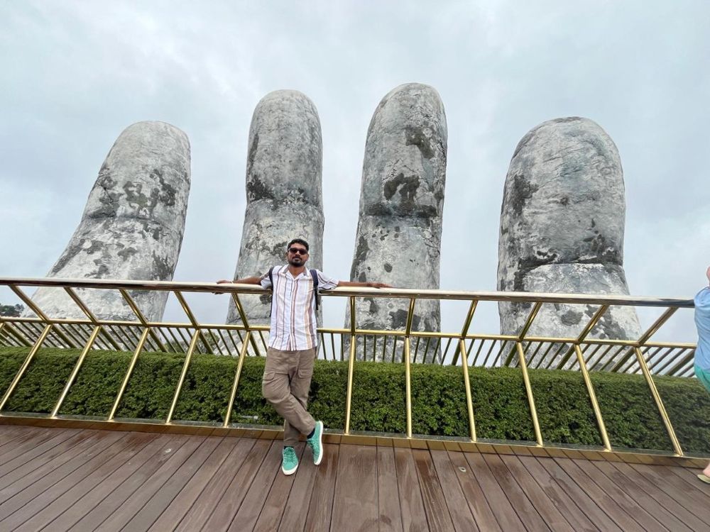 Ram on the Golden Bridge with giant stone hands, Ba Na Hills